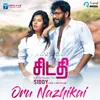 About Oru Nazhikai Song