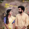 About Ee Vizhikalil Aaro Song