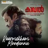 About Kaarmekham Moodunnu From "Kaaval" Song