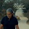 About Uzaklar Song