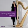 Swinging harp