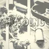 Holding