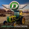 I min gröna John Deere