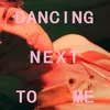 About Dancing Next To Me Song