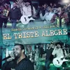 About El Triste Alegre En Vivo Song