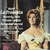 About Verdi: La Traviata, Act 1: "Si ridesta in ciel l'aurora" (Tutti) Song