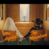 About Me Against the Mountain Song