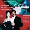 About Verdi: La traviata, Act 1: "Si ridesta in ciel l'aurora" (Chorus) Song