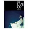 About Zuo Zai Da Jie De Nu Zi Sandy Live '07 Song