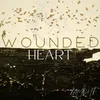 About Wounded Heart Song