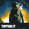 About Topping it Song