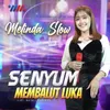 Senyum Membalut Luka