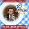 About I've Got A Tiger By The Tail Live At Larry's Country Diner Song