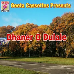 Dhaner O Dulale