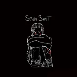 SEWN SHUT