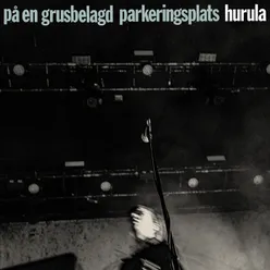 På en grusbelagd parkeringsplats (Live)