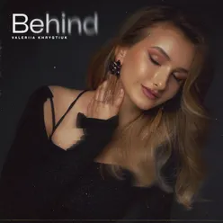 Behind